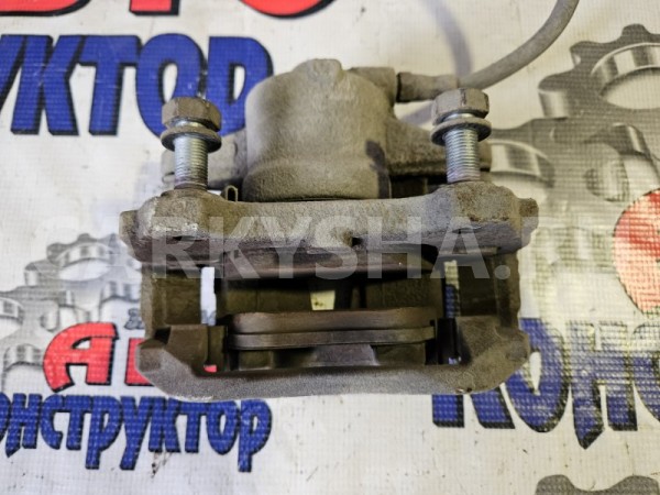 Суппорт тормозной Opel Corsa 