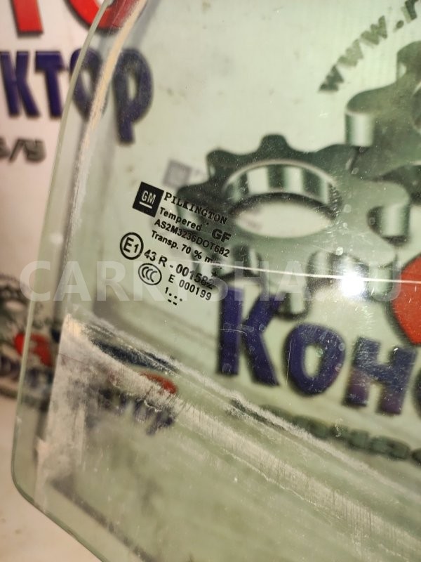 Стекло двери Opel Astra 