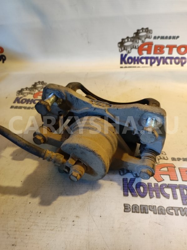 Суппорт тормозной Chevrolet Lacetti 