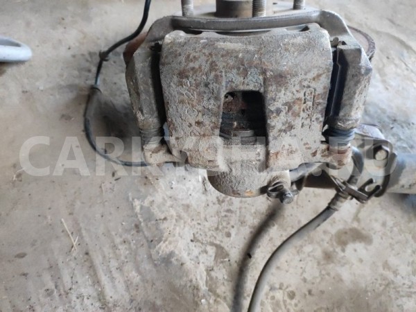 Суппорт тормозной Chevrolet Lacetti 