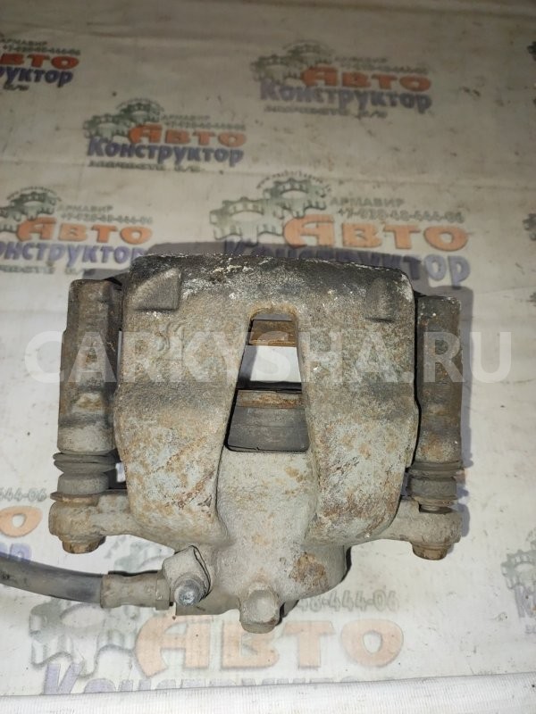 Суппорт тормозной Opel Corsa 