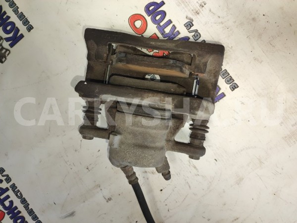 Суппорт тормозной Nissan Almera 