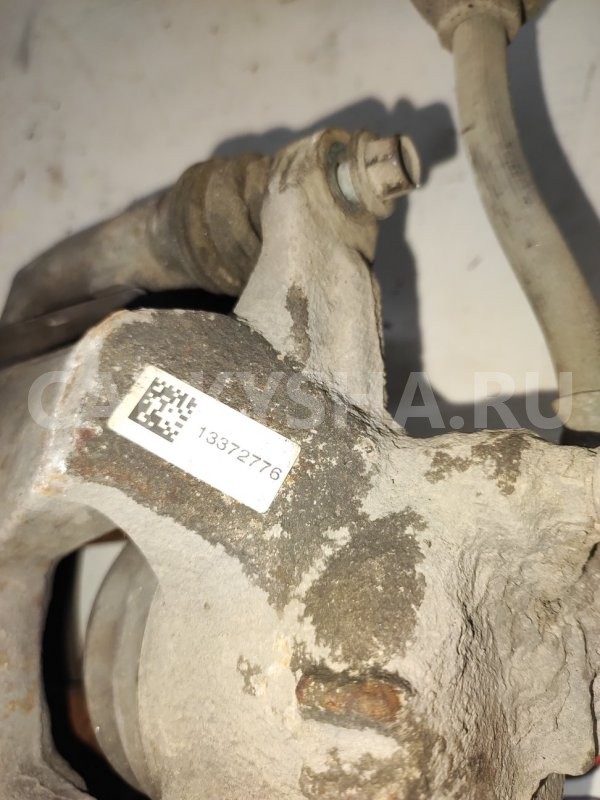 Суппорт тормозной Chevrolet Cruze 