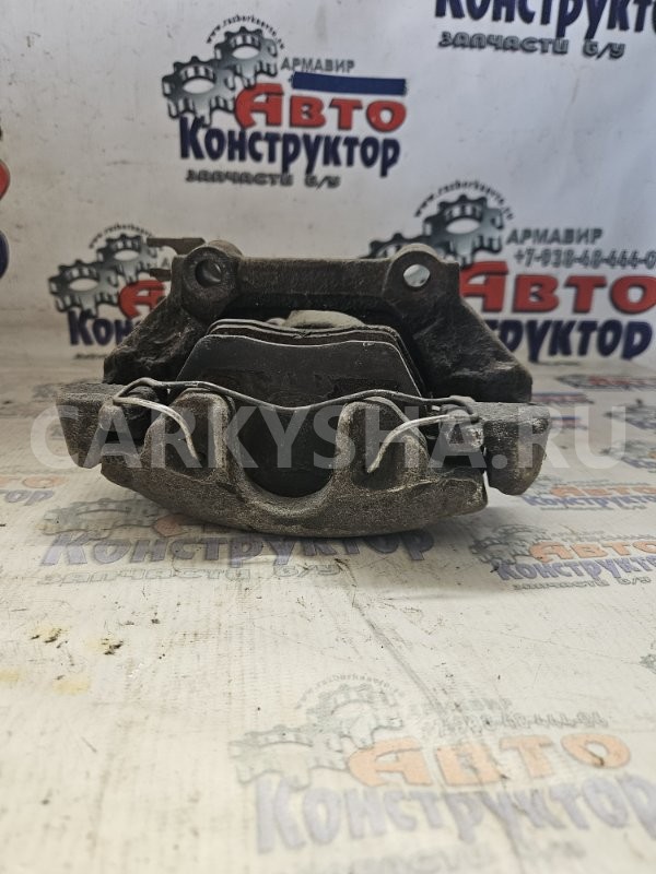 Суппорт тормозной Volkswagen Passat 