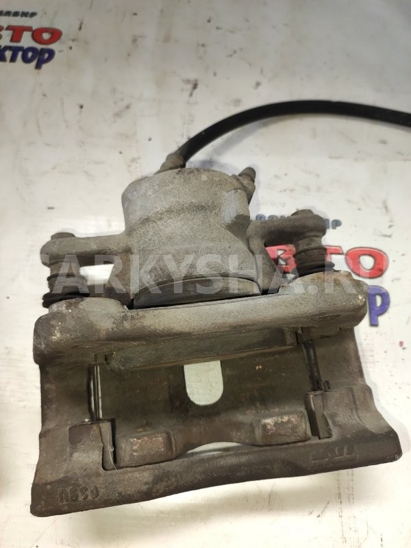 Суппорт тормозной Nissan Almera 