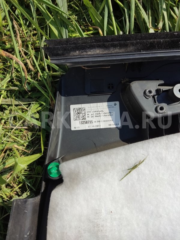 Обшивка боковой двери Opel Astra 