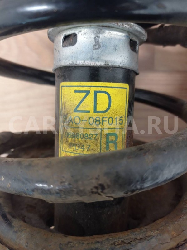 амортизатор передний Chevrolet Aveo 