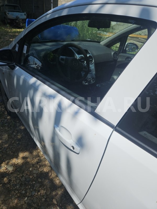 Стекло двери Opel Corsa 