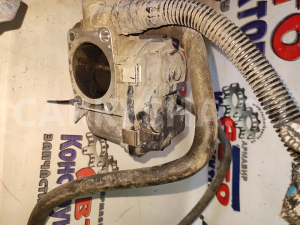 Дроссельная заслонка Opel Astra 