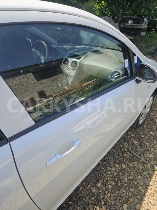 Стекло двери Opel Corsa 