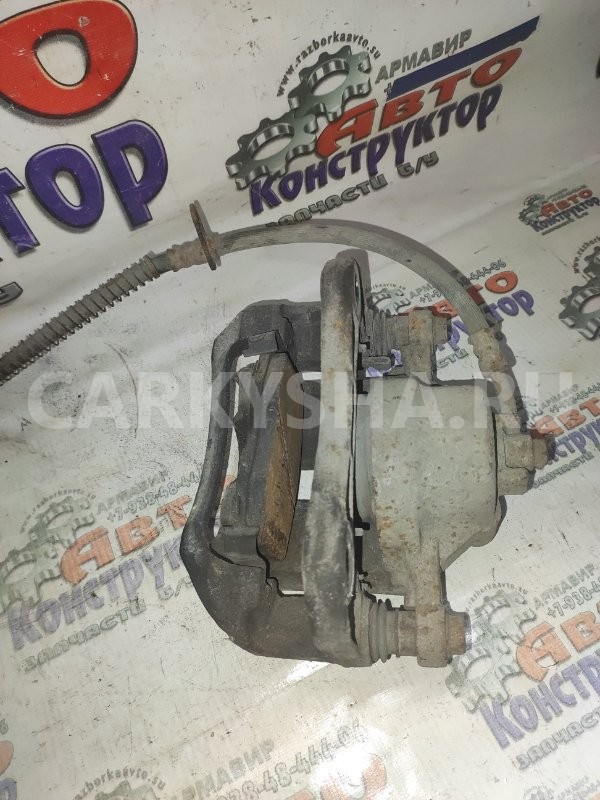 Суппорт тормозной Kia Rio 