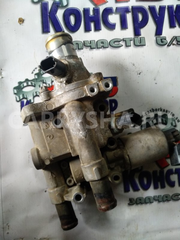 Корпус термостата Opel Astra 